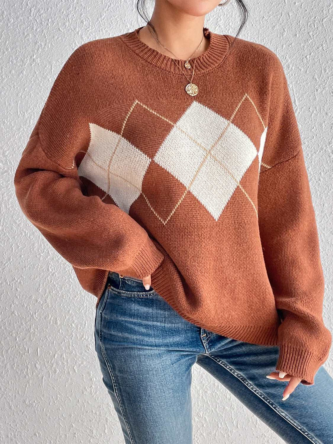 Side of the dropped shoulder sweater.